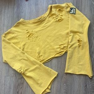 LF YELLOW RIPPED FLARE CROP TOP